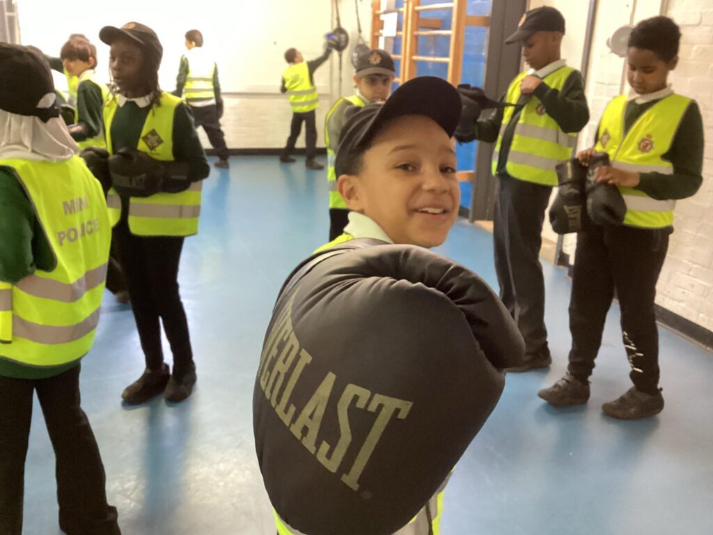 Evergreen’s Mini Police learn fitness skills at Empire Fighting Club